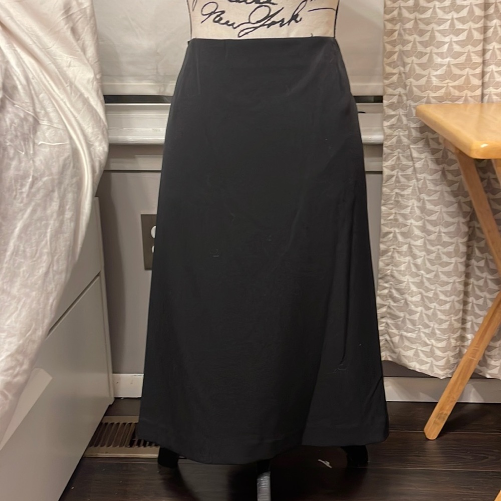 Black skirt, hits mid shin.  NWT.  Size 18